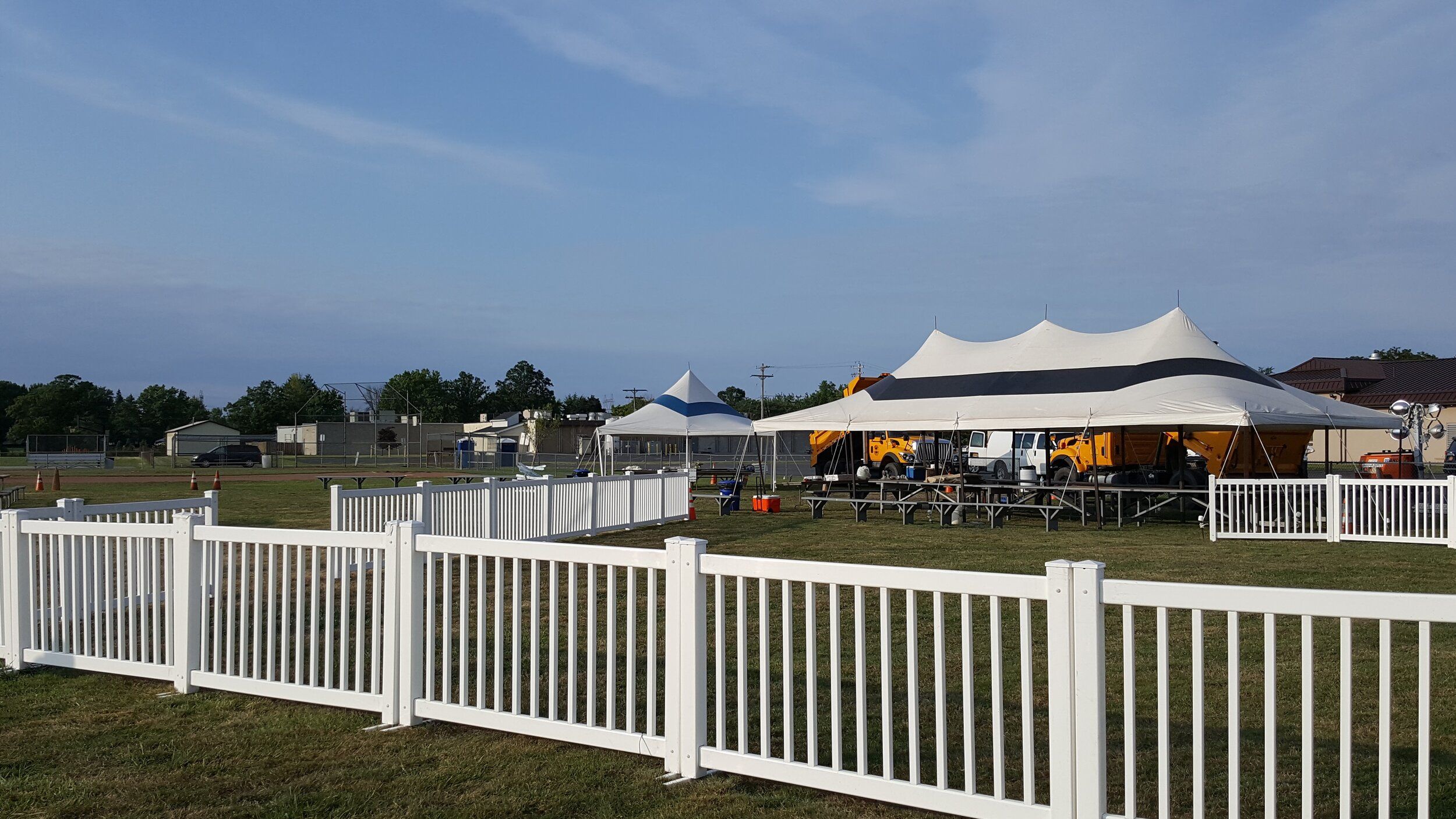 Decorative white picket event fencing rental for elegant outdoor events in UAE