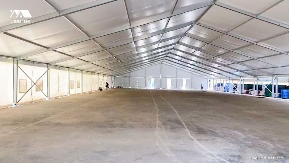 Industrial labour tent interior in UAE - large clear span warehouse tent structure for worker shelter and construction storage by Mahraj Industries