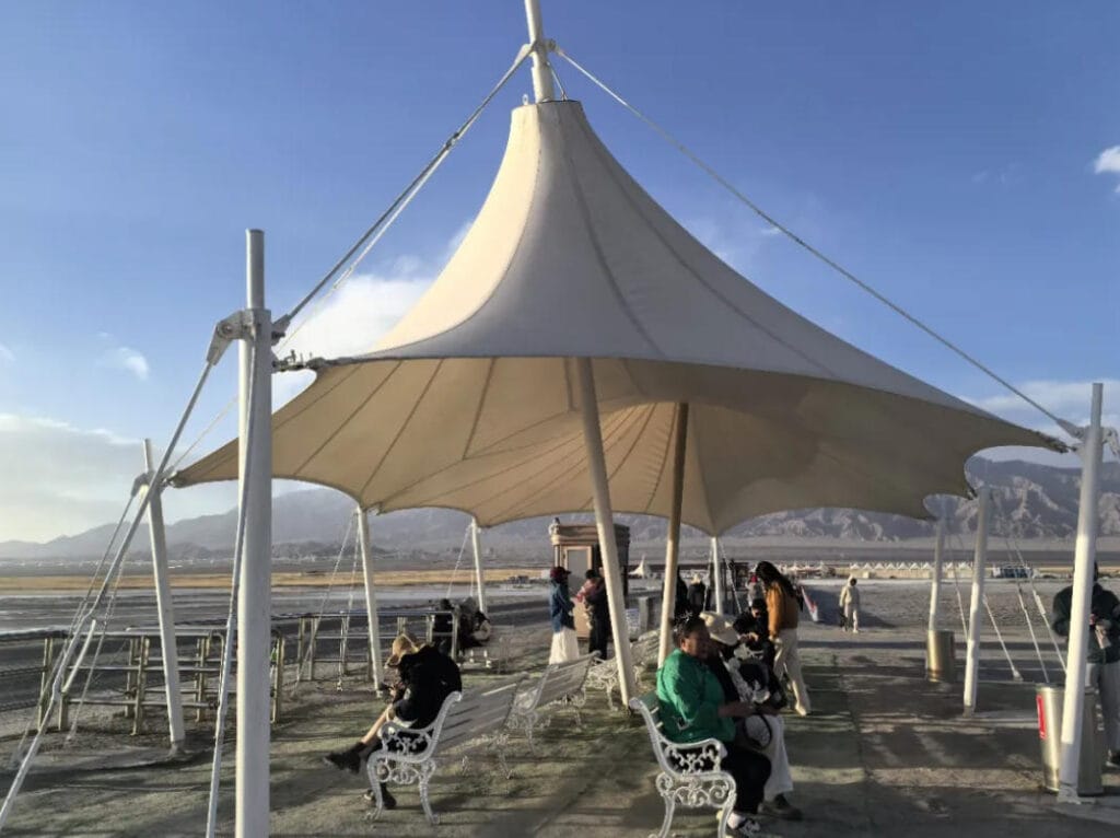 Conical tensile structures UAE - elegant cone-shaped tensile shade canopy for parks and public areas in Dubai