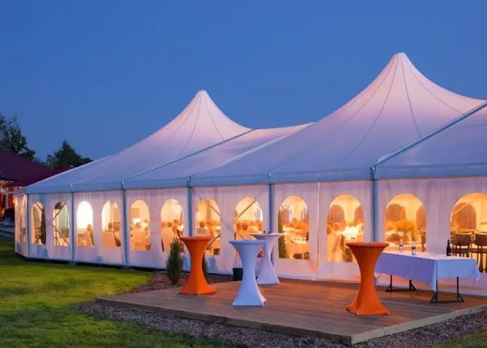 Professional event tent rental setup in UAE - large white tent structure for outdoor events and conferences in Dubai