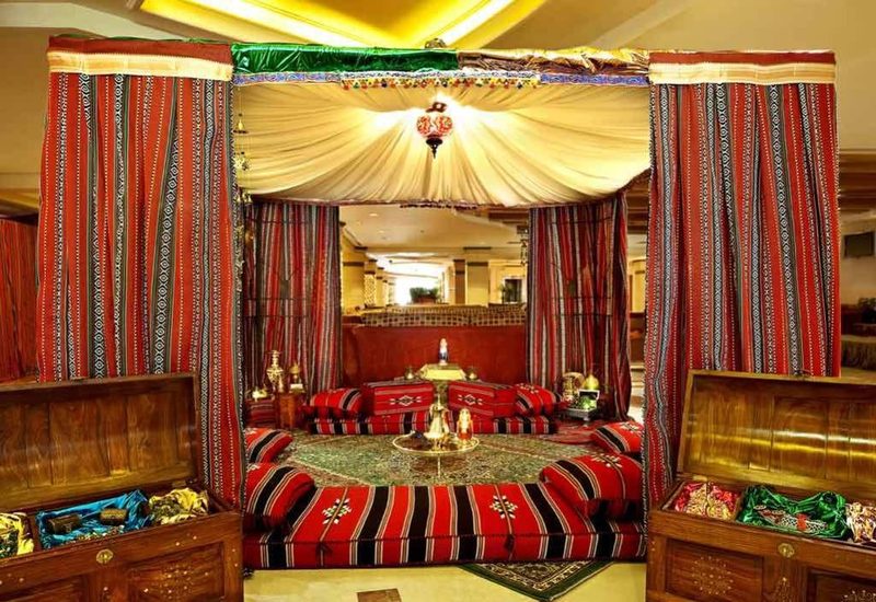 Traditional Arabian Majlis tent rental in UAE - elegant Majlis seating arrangement for cultural events in Dubai